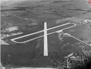 Aerial view of Holdenville Municipal Airport, 1949 (21810.593, Jim Cloud Collection, OHS).