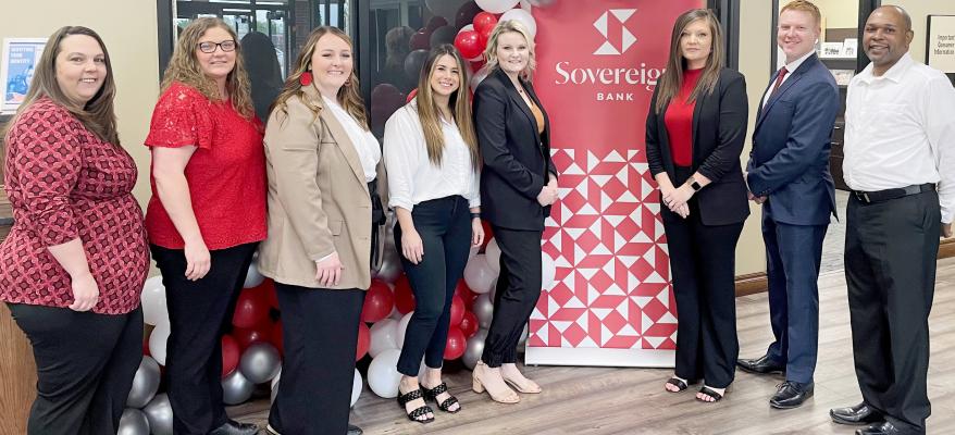 SOVEREIGN BANK CELEBRATES FIRST OPEN HOUSE UNDER NEW NAME. Bank employees pictured above welcomed several guests to the newly branded bank for its Open House last week. They are (L-R): Robyn Bates, Traci Bowen, Branch Manager Breana Hester, Alexa Robinson, Macy Davis, Vice-President Lindsey Phillips, Asst. Vice-President Justin Moon, and Marcus Brown. Additional photos page 7.