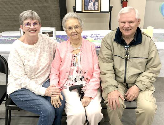 Shirley pictured with former Texas Banner Church of God pastor Eddie Wrinkle and his wife Tabitha.