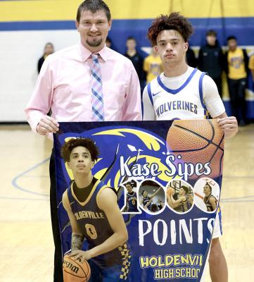 COACH DILLION SNOW AND KASE SIPES REPRESENTED THE HOLDENVILLE WOLVERINES IN THE OKLAHOMA BOYS BASKETBALL ALL-STAR GAME. Coach Snow and Kase Sipes were chosen because of their outstanding coaching and playing during the 2024-2025 basketball season.