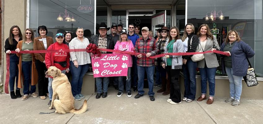 BETTY WILSON IS EXCITED TO ANNOUNCE THE GRAND RE-OPENING OF THE LITTLE DOG CLOSET. The business has moved around the corner to Main Street between Sharpes and Dynamic. Members of the Chamber pictured above held a ribbon cutting to highlight to business’s reopening. Be sure to stop in for all of your pet’s personalized needs.