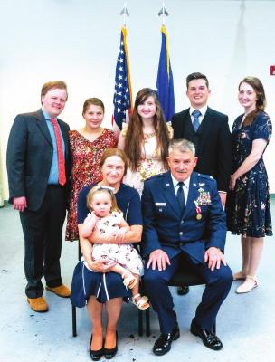 Pictured above is Lt. Colonel Bill Wilkinson and his family, bak row L-R: Alex Workman, Bonnie Workman, Olivia Fullbright, Gunner Fullbright, and Lorena Reddish. Front Row: Julie Wilkinson holding granddaughter Julietta Workman and Lt. Col. Bill Wilkinson