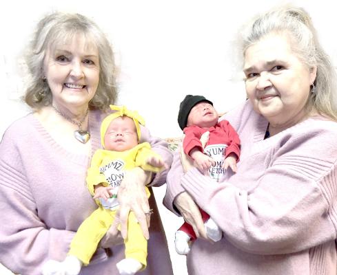 SEEING DOUBLE... Twin sisters Deborah Harris (left) and Barbara Maxswell (right) holding Deborah’s new twin great-granbabies, Tennyson Tauriel and Darren Dylan.