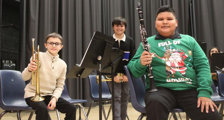 THE BAND IS GETTING BACK TOGETHER. Chevy Meeks, Gideon Barker, and Alton Lueveno put on quite a show at this year’s middle school band concert.