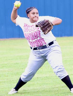 Wolverine outfielder, Raelee Johnson, was practicing her long throws during a early morning workout. Johnson is expected to be a starter in left field.