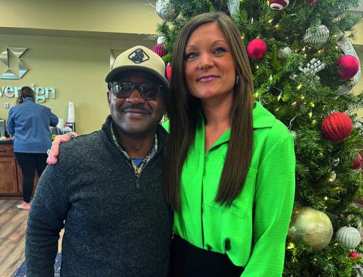Brian Williams was happy to see Holdenville Market President Lindsey Phillips at the Sovereign open house.
