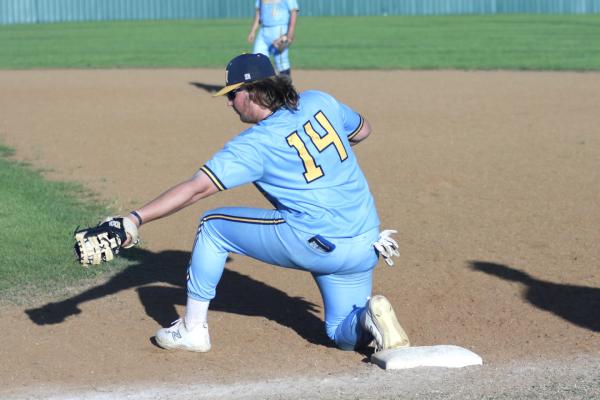Holdenville first baseman, Clinton Roland, scoops up a low throw in Holdenville’s game with McLoud. Holdenville is scheduled to go to Lexington Monday, host Lexington on Tuesday, travel to Seminole on Thursday, travel to Okemah on Friday and travel to Heritage Hall on Saturday.