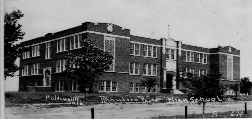 The above picture of Holdenville High School was taken before the great fire of 1930 which cost the building its entire third story.