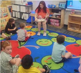 Holdenville 4-H MemberBailey Sisco read to studens in the classroom at Reed Elementary this past week.