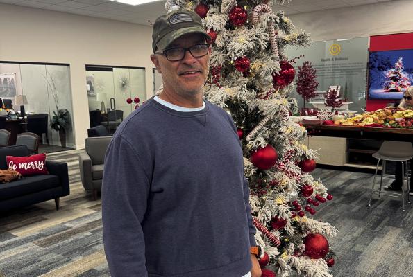 Danny Mills was one happy customer at First United Bank’s recent open house.