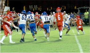 Holdenville defender # 9, Cash Carter, ran down this Davis running back in the first quarter of the Wolverines game at Davis. #62, Donovann Gibbs, # 11 Wyatt Seeley and # 22 Sawyer Jeffrey sprint to assist Carter. Holdenville will host Tishomingo-Mill Creek this Friday.
