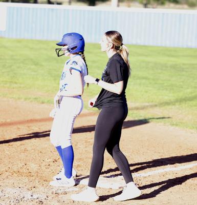 Holdenville assistant coach, Brooke Brown, gives instructions to Lucca Smith in Holdenville’s win over Wetumka. Holdenville will play Meeker at Noon in the district tournament at Oktaha.