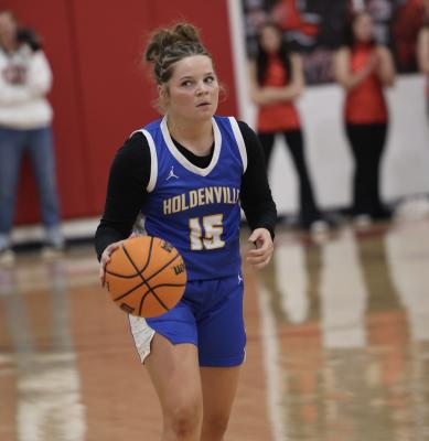 Bella Smith was looking out of the corner of her eye before passing to a team mate. The Wolverines will host Wewoka on Tuesday and travel to Meeker on Friday.