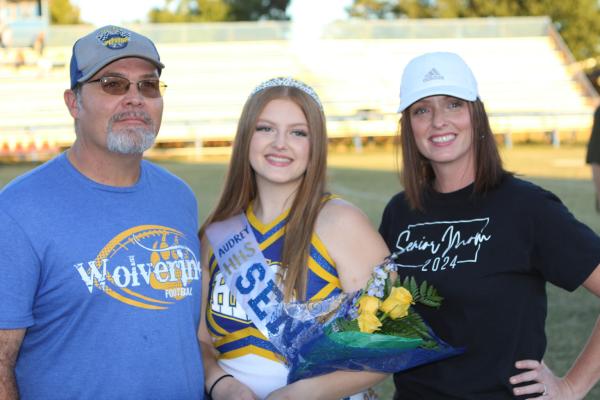 Audrey Miller with parents Cameron and Alicia