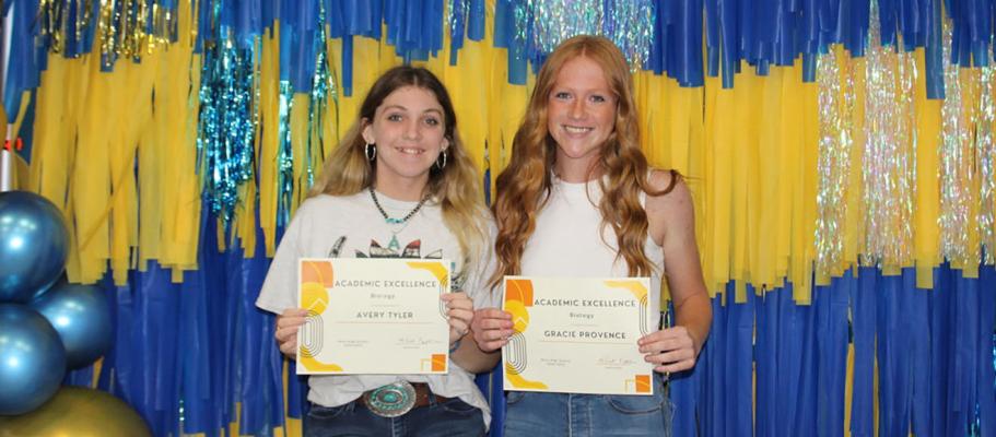 Avery Tyler and Gracie Provence receiving Academic Excellence Awards in Biology