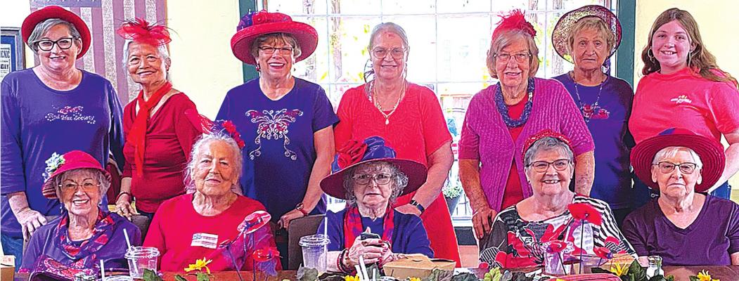 Red Hatters meet at Tomato Patch for August luncheon