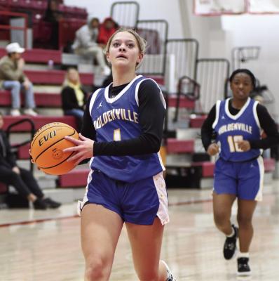 Daisy Wood drives to the basket.