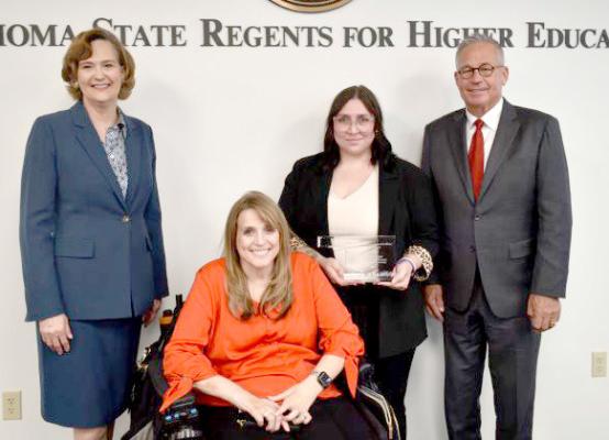 The College of Arts and Sciences Outreach Team from Oklahoma State University was given the award for Innovation. Pictured above are Chancellor Allison Garrett, Dr. Bobbi Kay Lewis, Nichole Fox, Regent Jack Sherry