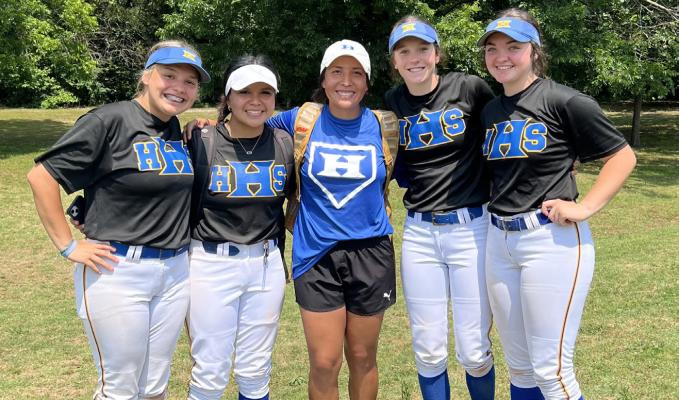 COACH ANGEL JOHNSON POSED WITH HER SENIORS during a summer pride work out. Softball season will begin July 15. Left to right: Melissa Merriman, Ryleigh Hill-Tiger, Coach Johnson,Belle McFarland, Cylee Null.