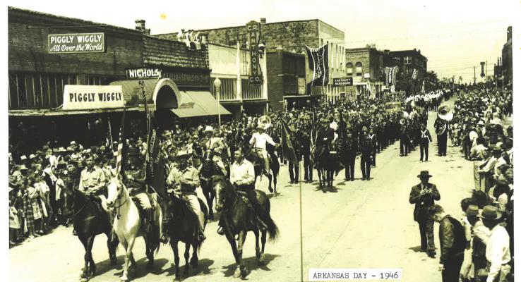 OVER 20,000 PEOPLE ATTENDED THE ARKANSAS DAY PARADED IN HOLDENVILLE IN 1946... The largest ever crowd to gather for any event in Holdenville. The Parade Marshals pictured above are Front Row (L-R): Stanley Huser Jr., Toney Jack Lyons, Dick Turner, Dick Barnhart. Back Row (L-R): Johnny Lee Wills, C.A. Moore, and Tom Anglin.