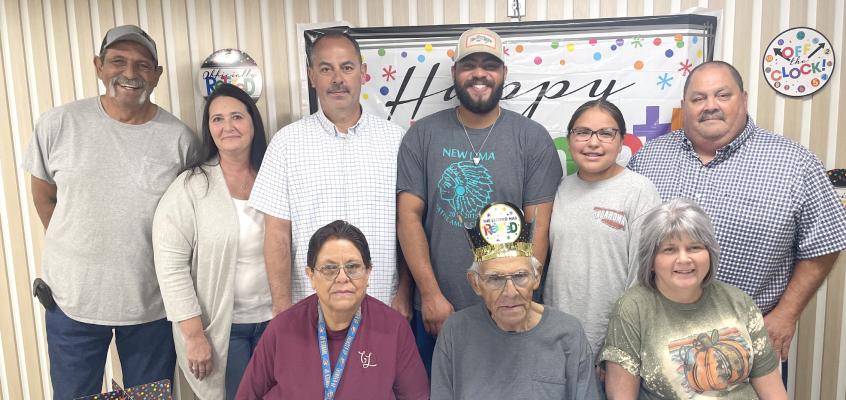 At 92 years young, Charles Maylen has retired from Holdenville Walmart after 22 years of hard work. Charles has become a staple in our local store. He could be seen every day of the week working and welcoming those coming and going. Charles has worked in every position except cashier in the store and says, “It has been a joy to work here.” Charles is pictured above with family (L-R): Keith, Valerie, Danny, Brady, Avery, Dewayne, (Seated): Deanna, Charles, and Becky Maylen.
