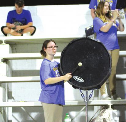 Holdenville drummer, Riley Gaines, helps provide a good beat to inspire the Wolverine football team.