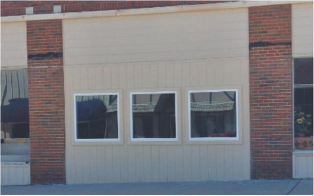 Left - New windows at the Hughes County Historical Society. Repairs completed by Chad Stanford and his crew while dodging the rain and storms. Great work Chad!