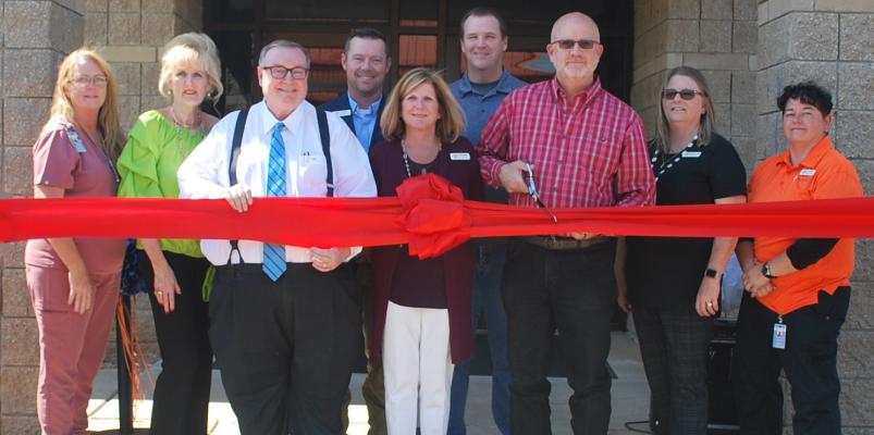 Pictured left to right: Linda Scott, WWTC MSHP Instructor; Melinda Johnson; Glen Johnson, Oklahoma State Regents for Higher Education Chancellor Emeritus; Mike Lindley, WWTC WED Director; Linda Sanford, WWTC Instructional Leader and Adult Health Careers Coordinator; James Berry, WWTC Board President; Vic Woods, WWTC Superintendent; Rhonda Dalluge, WWTC Practical Nursing Director and Instructor; Angela Powell, WWTC Practical Nursing Instructor.