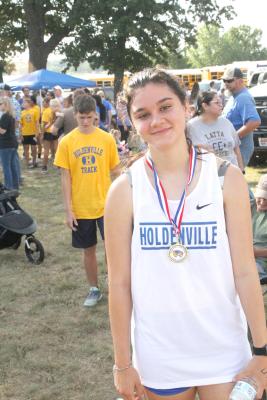 Brooklyn Nelms ran well at the regional cross country meet and has earned the right to run at state!