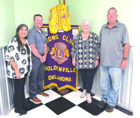 INSTALLATION OF NEW MEMBERS: Lion Lori Woods sponsor, Lion Mike Lindley and Lion Theresa Barkhimer, Mike Dockery sponsor.