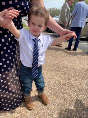 Looking sharp! Noah was in his Sunday best as he led his mom, Shelby around the church after service ended.
