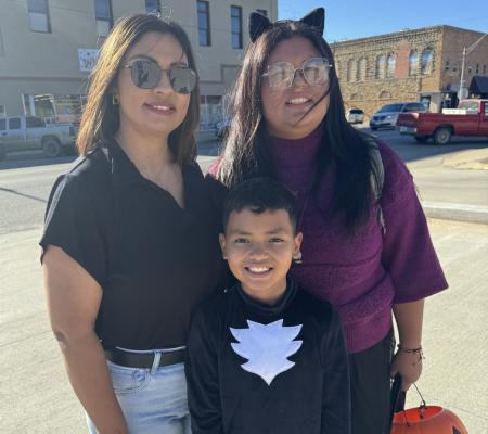 Bernice Lueveno enjoyed downtown trick-ortreating with her kids, Allison and Adam on Halloween last week!