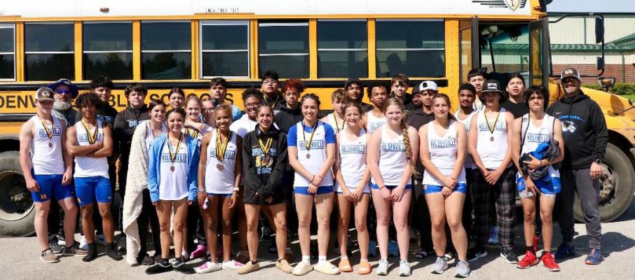 The Holdenville Wolverine track team will completely fill a bus! The Wolverines traveled to Henryetta last week for their first meet of the season. Several Wolverines won medals and they were proudly displaying the hardware they earned in the picture.
