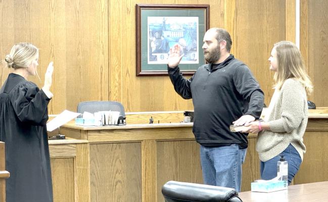 TREVOR TEAGUE WAS SWORN IN AS HUGHES COUNTY SHERIFF FRIDAY, November 1. Teague, pictured above with his wife Morgan, was sworn in by Associate District Judge Trisha Smith. Teague began his law enforcement career in the prison system back in 2014. He joined Hughes County as a Deputy in 2014 and was named Undersheriff in 2022. Trevor and his family are well-liked and respected throughout the community and surrounding areas making him a great choice for Hughes County.
