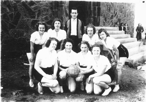 1938-39 YEAGER BASKETBALL TEAM—(left to right) Front Row: Katheleen Fite, Juanita Barnes, Nadine Jennings and Nokie Mayfield. Back Row: Betty Jean LaBarron, Monnie Barnes, Mr. Liggean (Coach), Mable House and Hazel Barnes.