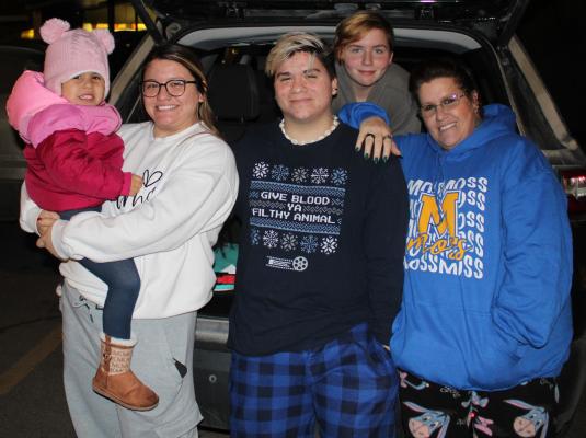 Nevaeh is all bundled up and happy to be with her family at the Holdenville Christmas parade. She is pictured here with her mom, Jessica Long, her Uncle Jordan Long, Aunt JoAnna Long, and Grandma Nicole Cellars.