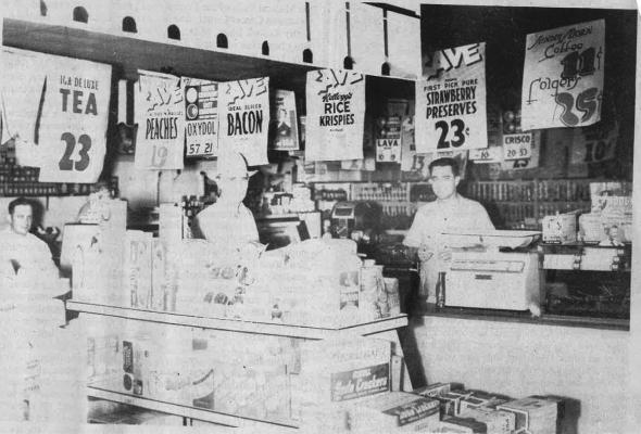 The Holdenville store had lots of bargains. Pictured aboce are Gene Puckett, Allen Wall, and Wall.