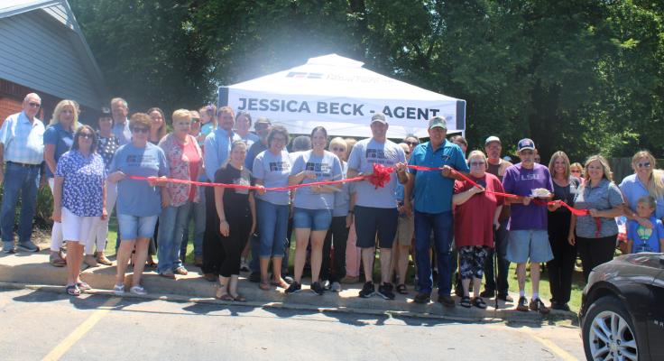 Ribbon cutting held for Farm Bureau-New Agent Jessica Beck