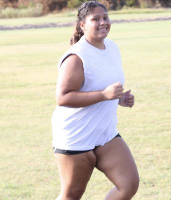 Wolverine senior, Autumn Jackson, flashed a big smile as she completed her mile run on the first day of softball practice. The softball team has been working hard to prepare for the upcoming season.