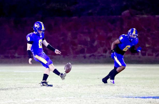 How do you start an important district game? It starts with a kickoff! Abe Gomez kicked off for the Wolverines. Joe Remis headed down field for a tackle in the Wolverines’ 22-7 win over Dibble.