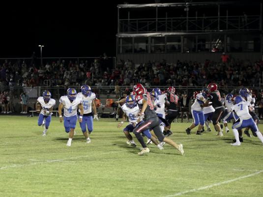 Holdenville stampede. The Wolverines are 3-0! #11 Izaia King is shown running behind the blocking of # 5, Cy Tiger, # 4 Christian Zambrano, # 9, Cash Carter # 7, Gage Smith and a multitude of other Wolverines. Holdenville will host Davis Friday.