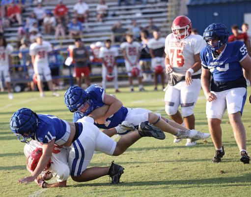 The Holdenville defense swarmed this running back in the Wolverines’ scrimmage at Antlers. Holdenville will scrimmage at Eufaula on Thursday.