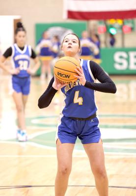 Holdenville’s Madyson Richmond takes aim as she sink another free throw.The wolverines will regroup over the Holidays and play at Atoka on January 6.
