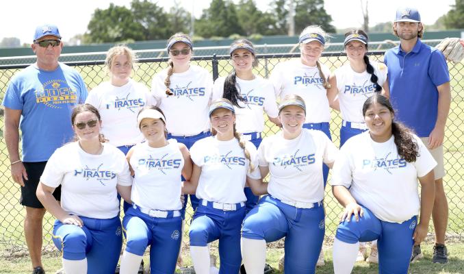 The Moss Pirates Softball Team scrimmaged at Holdenville last Friday. Team members include: Front Row: Jocelyn Rollins, Kayla Priest, Landri Mills, Elexis Stafford, Leah Harjochee. Back Row: Head Coach Mark Qualls, Kinzlie Barbre, Sloane VanHaren, Tara Keesee, Graycee Janes, Tanna Brown, Assistant Coach Tucker Brown. (photo by Tom Turner, Sports Editor)