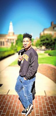 Imani Le’Shawn Dindy receives degree