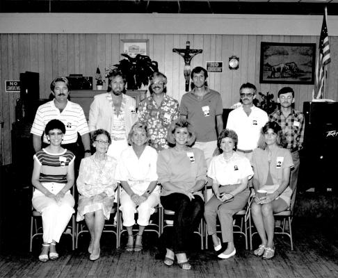 HOLDENVILLE HIGH SCHOOL CLASS OF 1967 AT THEIR 20TH REUNION BACK IN 1987. Pictured above are the students who were in Miss Nichols First Grade Class during the 1955-56 school year: Back Row (L-R): Terry Troup, Junior Seely, Lary Adams, Tom Tuern, Jimmy Roberts, and Gary Gentry. Front Row: Jane Stafford, Miss Jewel Nichols, Bonnie Abernathy, Sandra Timmons, Patty Powell, and Linda Rogers