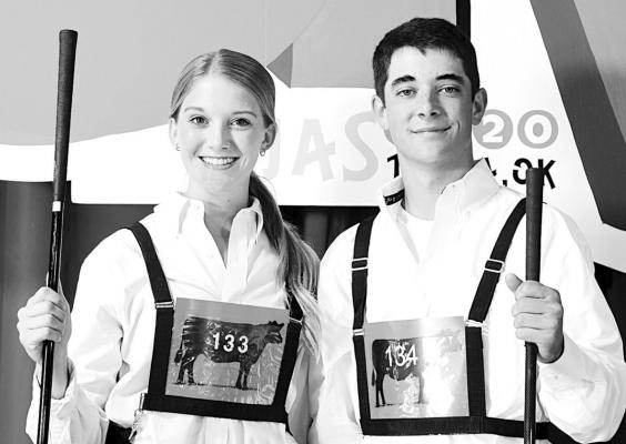 MADELYN GERKEN, Cashion, left, and Jackson Ray, Holdenville, right, represented Oklahoma at the 2020 National Junior Angus Showmanship Contest, held in conjunction with the National Junior Angus Show (NJAS), July 21-22 in Tulsa, Okla. Forty-nine youth from across the country competed for top honors in the 54th annual event. ~Photo by Pearls Pics on behalf of the American Angus Association.
