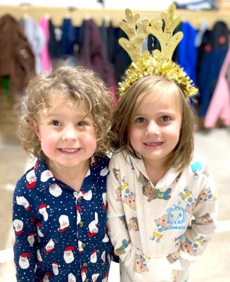 Karley Epperson and Penny Robinson are ready to celebrate Christmas at Reed Elementary in Ms. Porter’s Pre-K class.