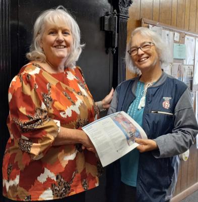 Secretary Lion Jerrie Lindsey welcomes and extends an invitation to become a member of the Holdenville Lions Club to Theresa Barkhimer, Holdenville City Manager