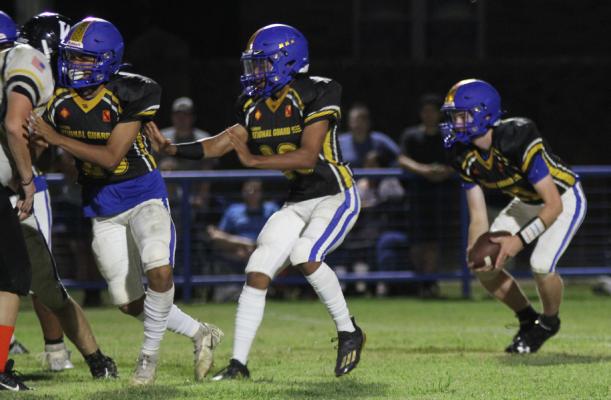 Holdenville’s Mike Larney, and Malichi Henderson lead the way for running back, Clayton Lavalley in the Wolverines 70-0 win over Wewoka. Holdenville will travel to Meeker this Friday to face off with the Bulldogs.